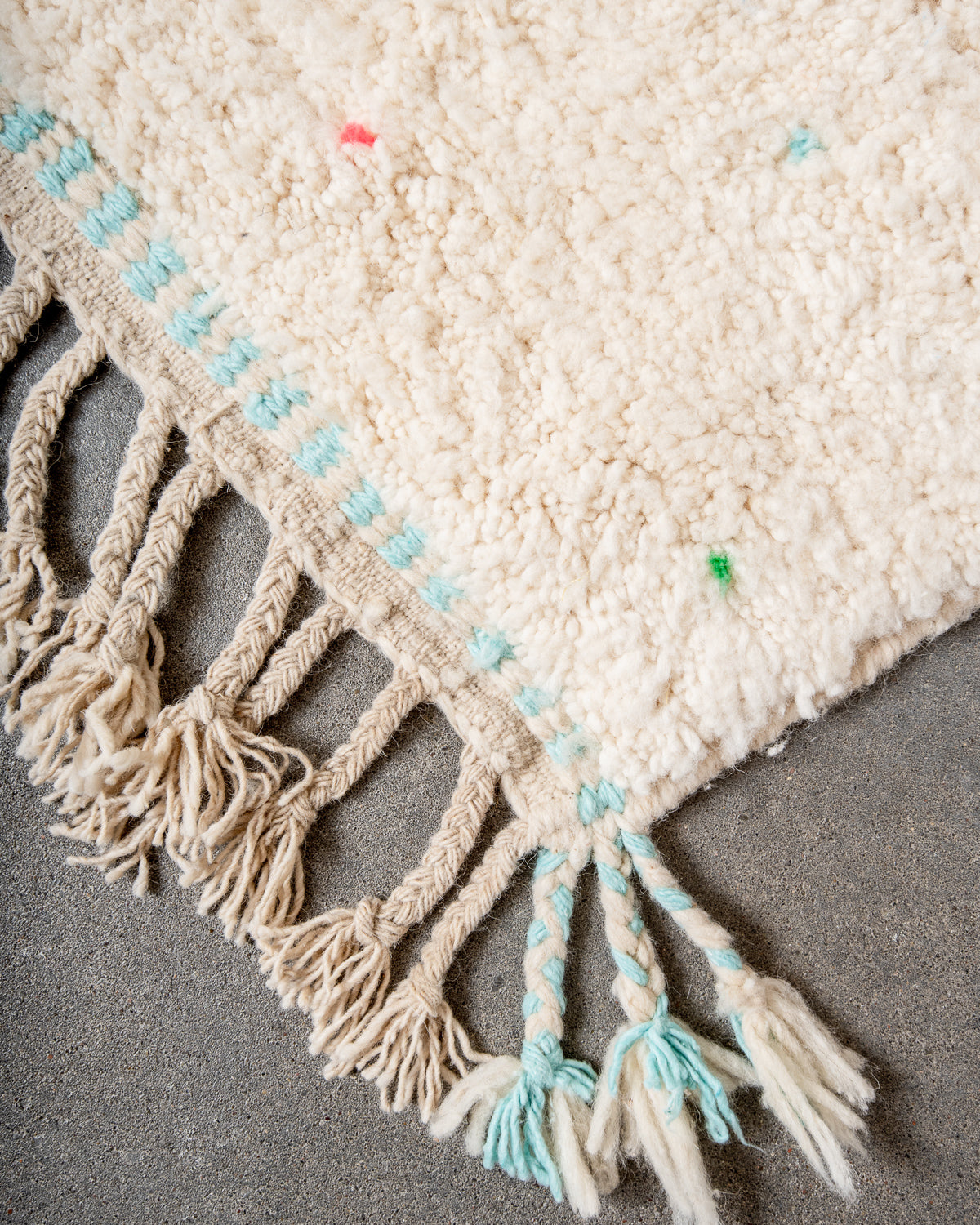 Modern, designer, handcrafted Berber rug from Morocco. Beniourain carpet with beautiful colours and patterns and fluffy wool texture.